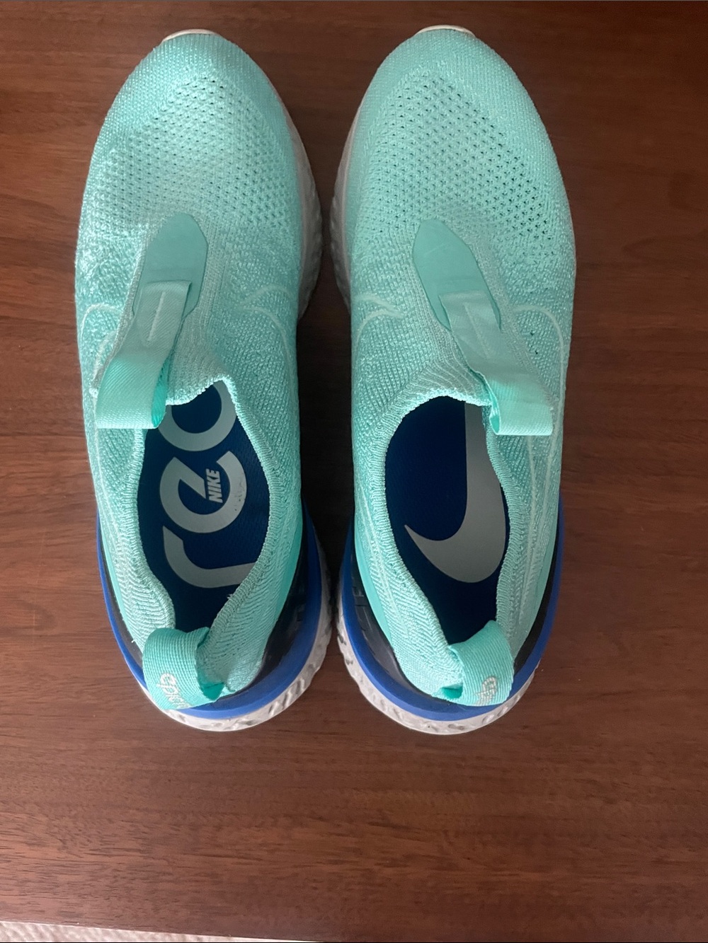 Nike Women’s Slip-On Sneakers in Mint and Blue